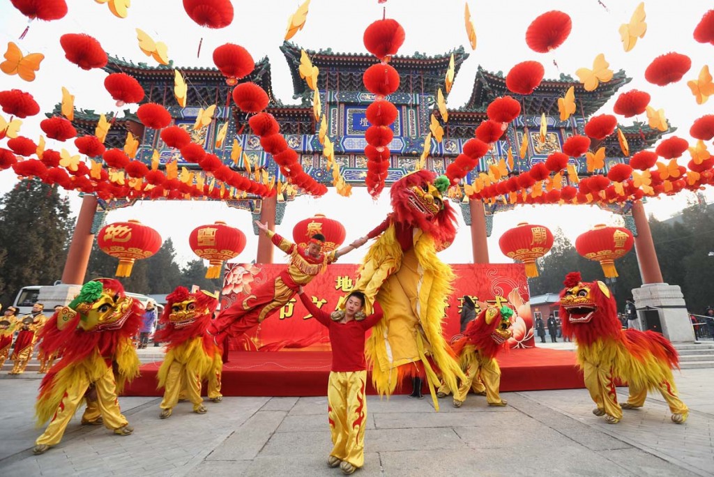 BEIJING, CHINA - FEBRUARY 09: Chinese folk artists perform during the opening ceremony of the Spring Festival Temple Fair at the Temple of Earth park on February 9, 2013 in Beijing, China. The Chinese Lunar New Year of Snake also known as the Spring Festival, which is based on the Lunisolar Chinese calendar, is celebrated from the first day of the first month of the lunar year and ends with Lantern Festival on the Fifteenth day. (Photo by Feng Li/Getty Images) ORG XMIT: 160395911